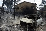 Foto de una casa quemada.